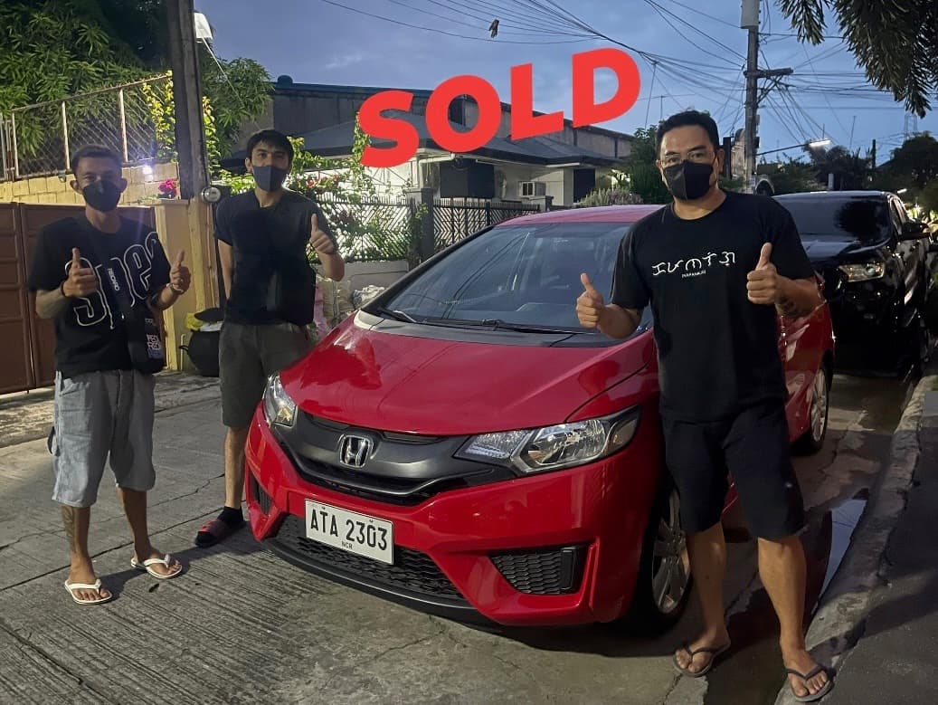 Red Honda Jazz photo