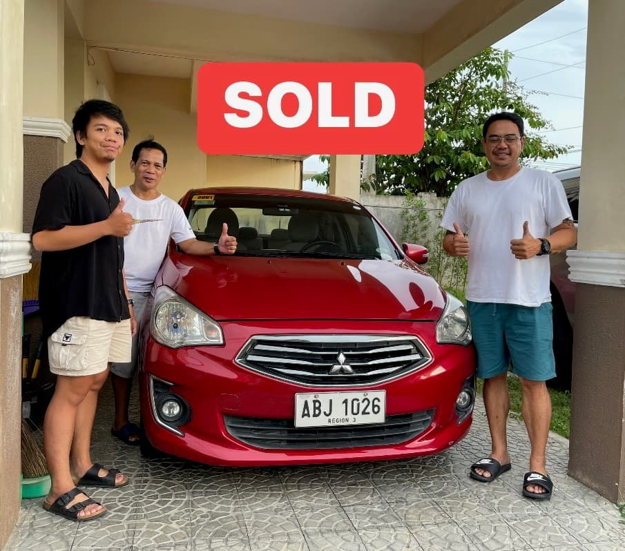 Red Mitsubishi Mirage photo