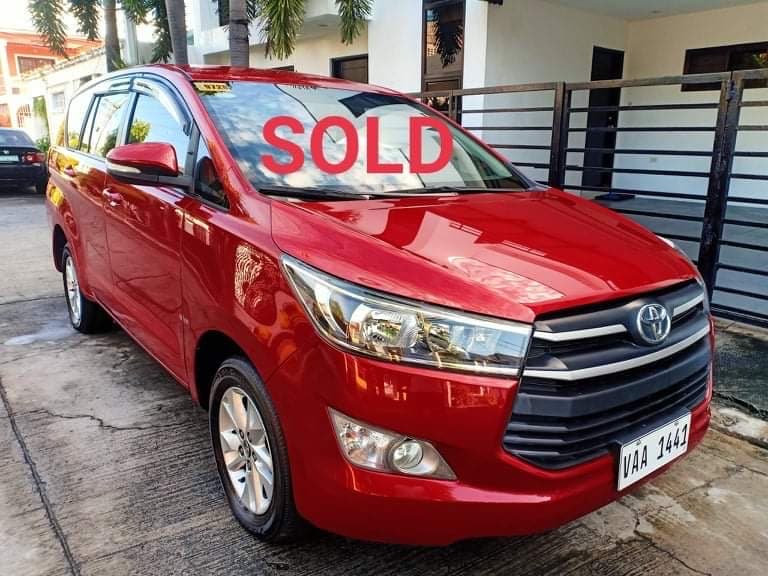 Red Toyota Innova photo