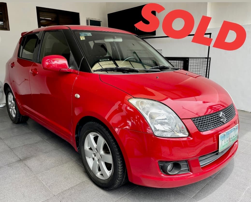 Red Suzuki Swift photo