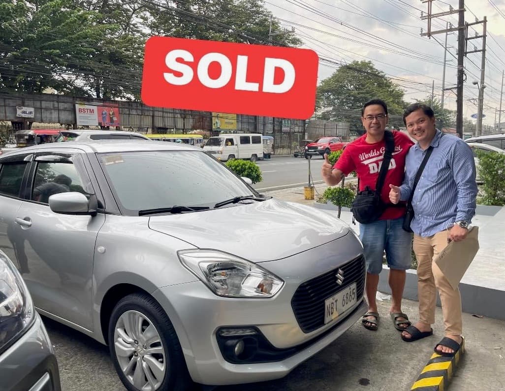 Silver Suzuki Swift photo